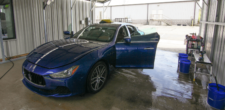 blue car, open door